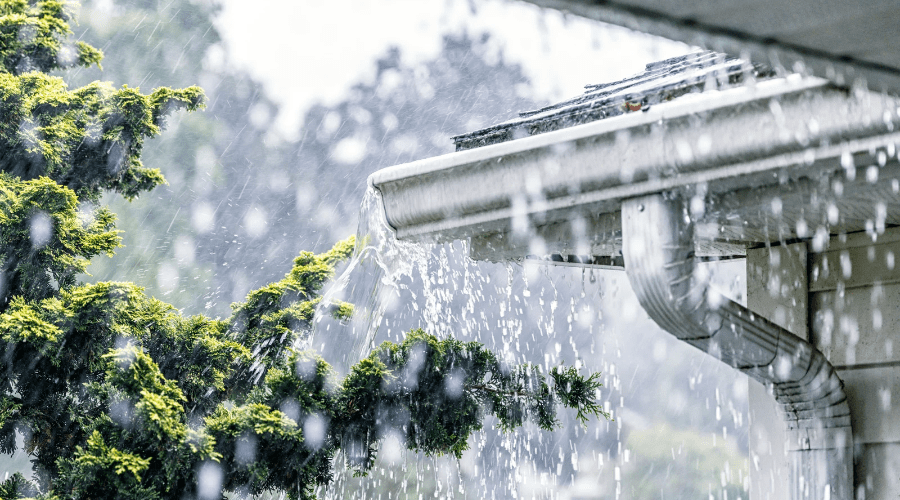 Heavy rainfall on residential gutters