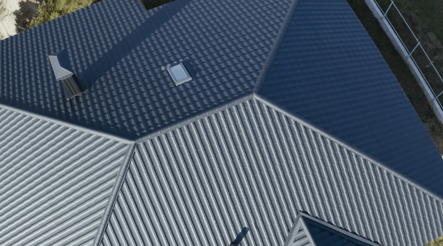 areal view of a dark hipped roof