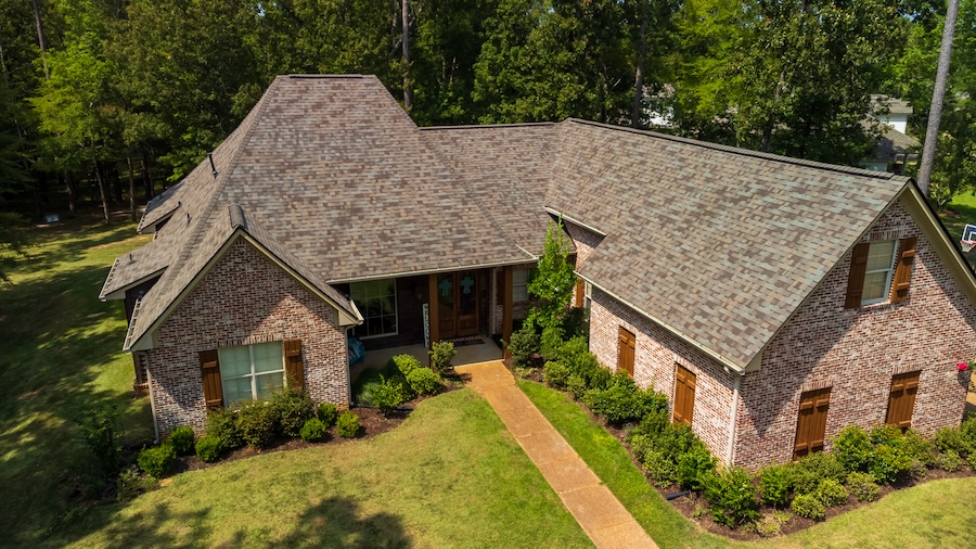Suburban house with newly installed shingles